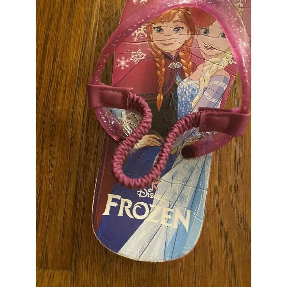 Frozen girls pink glittery flip flops